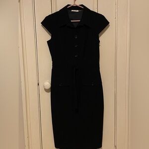 Calvin Klein black dress with front buttons and tie. Size 6